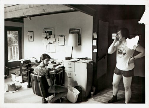  Gary Groth (sitting), Kim Thompson at the Fantagraphics "offices," Stamford, Connecticut, circa 1982.