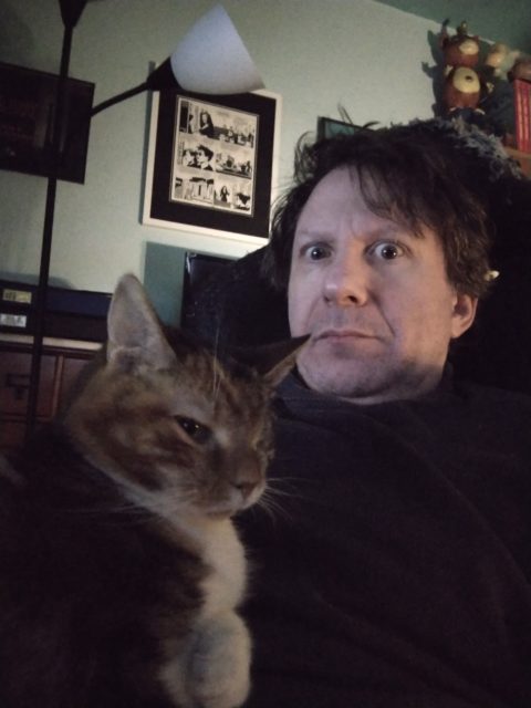Evan Dorkin (with cat Winky)