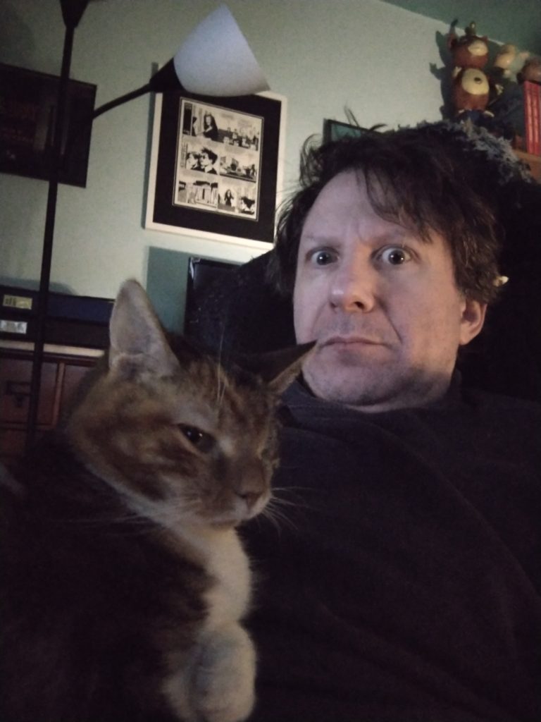 Evan Dorkin (with cat Winky)