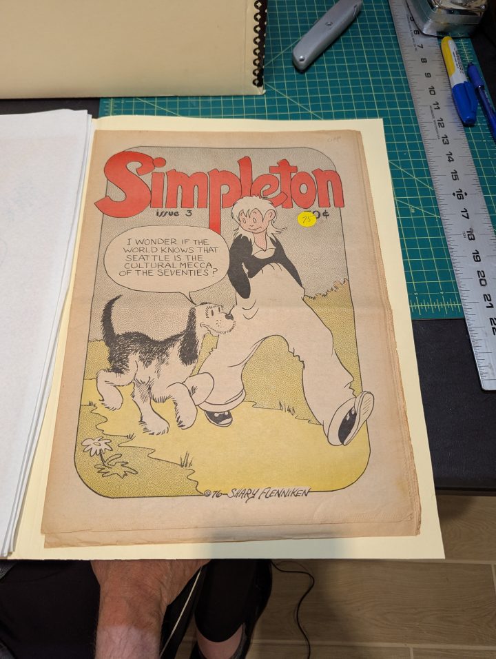 An issue of Simpleton with cover art by Shary Flenniken