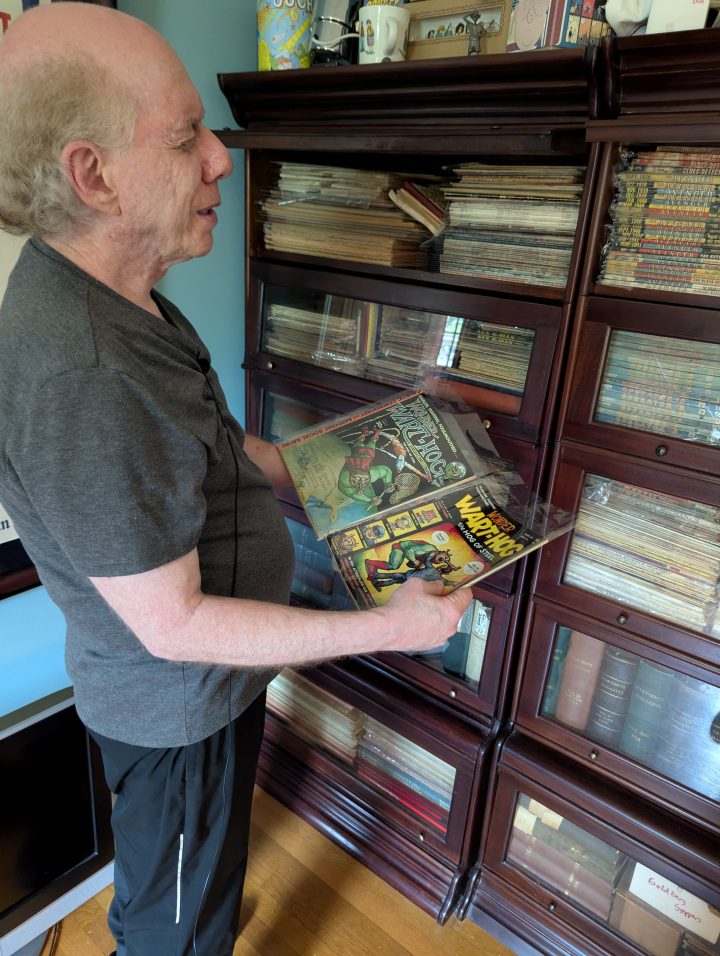 Warren with some issues of Wonder Wart-Hog by Gilbert Shelton.